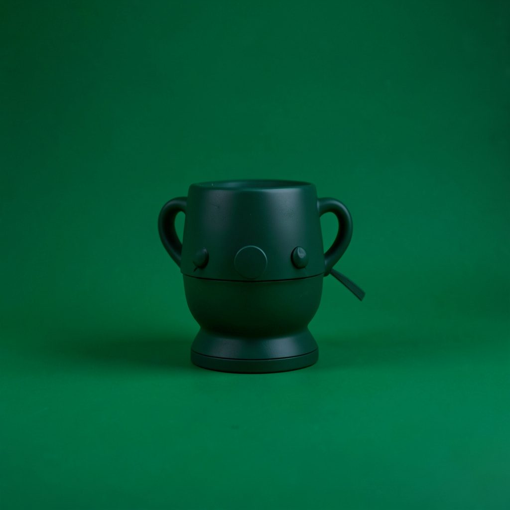 A collection of antique silver serving pieces arranged on a dark backdrop with a high-contrast mood